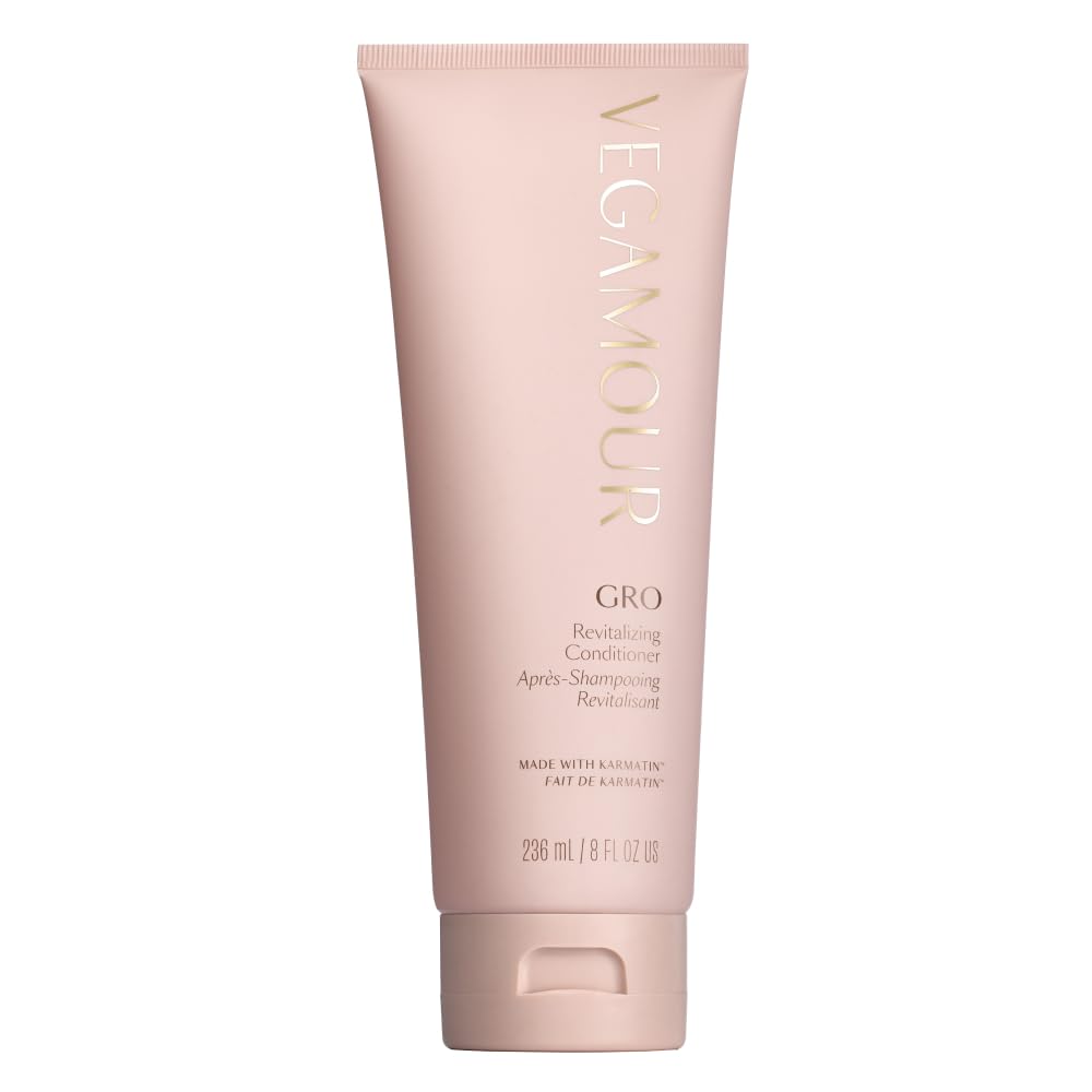 VEGAMOUR GRO Revitalizing Conditioner bottle closeup highlighting hydrating shine.