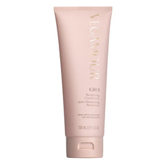 VEGAMOUR GRO Revitalizing Conditioner bottle closeup highlighting hydrating shine.