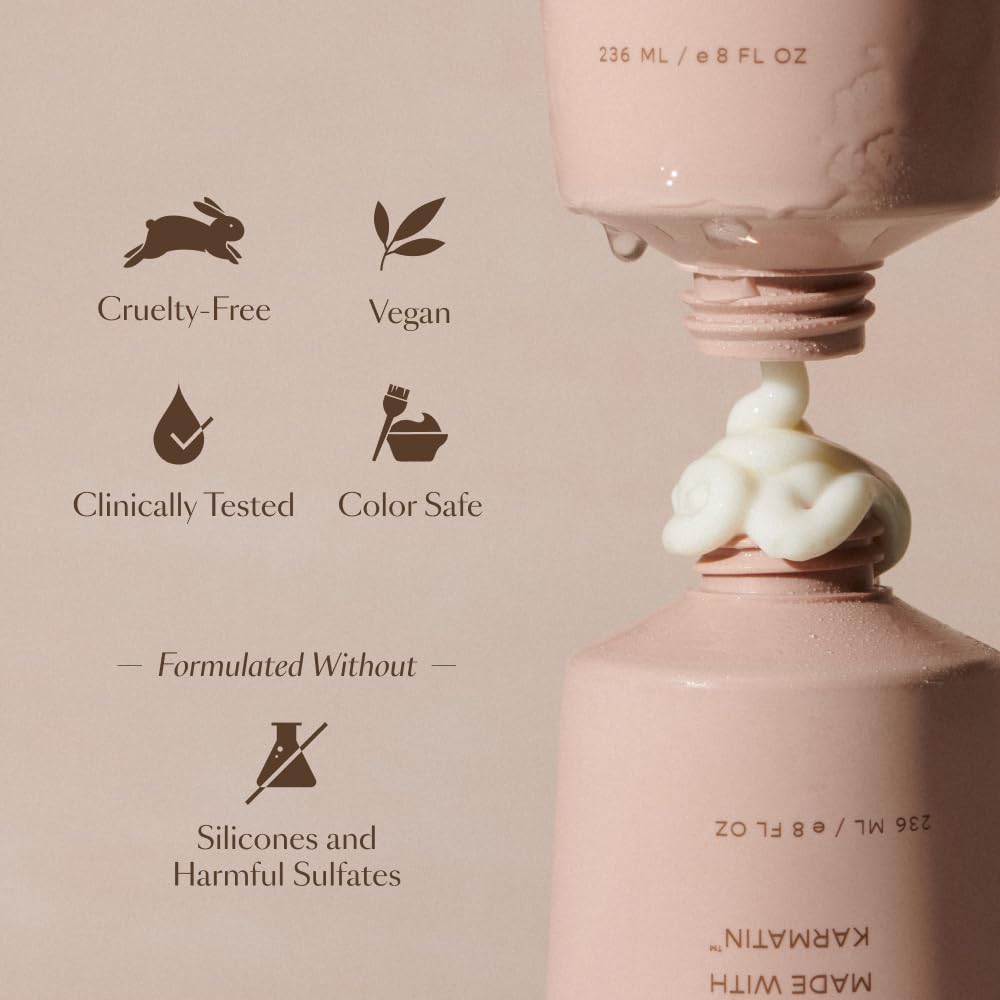 VEGAMOUR GRO Revitalizing Conditioner texture closeup displaying lightweight hydration.