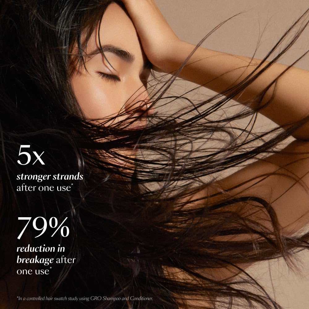 VEGAMOUR GRO Revitalizing Shampoo lather close-up highlights rich foam and scalp nourishment.