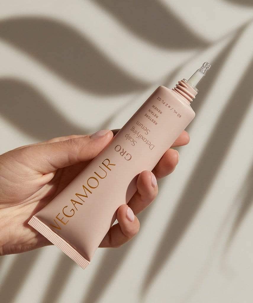 Oil-rich botanical blend in GRO serum for scalp balance.