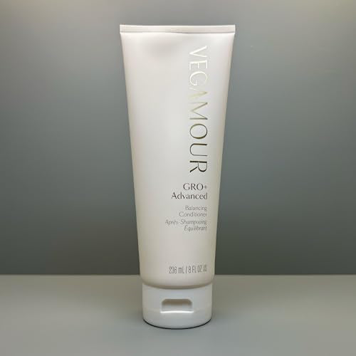 VEGAMOUR GRO+ conditioner applied to damp hair for balance and smoothness.