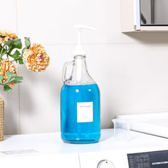 VEGEVIGI glass dispenser labels help organize detergents and fabrics.
