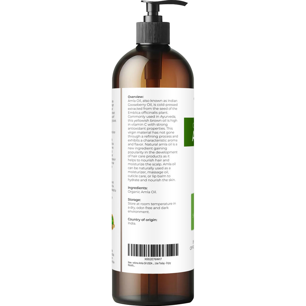 Velona Amla Oil droplet dispenses for scalp hydration and simple application.