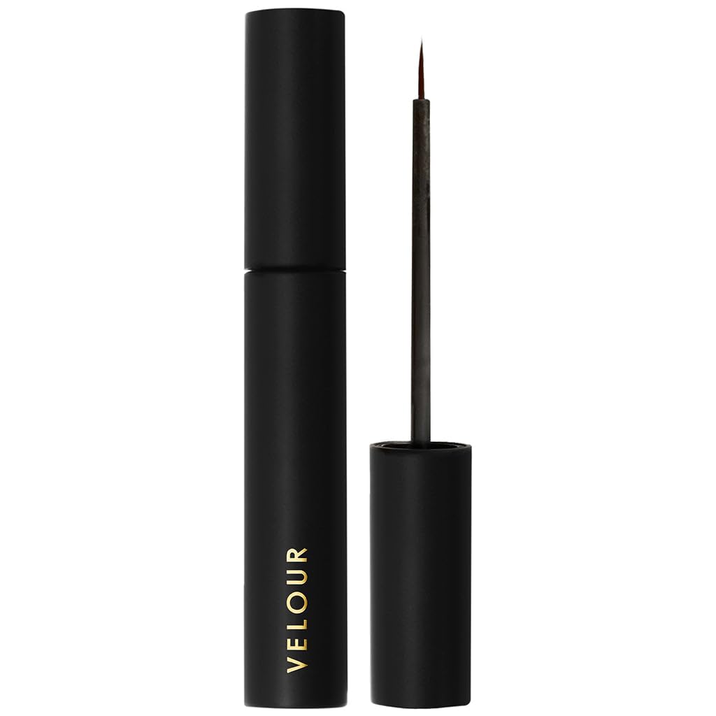 Velour Strong Eyelash Glue with brush-on applicator for precise, mess-free lash application.