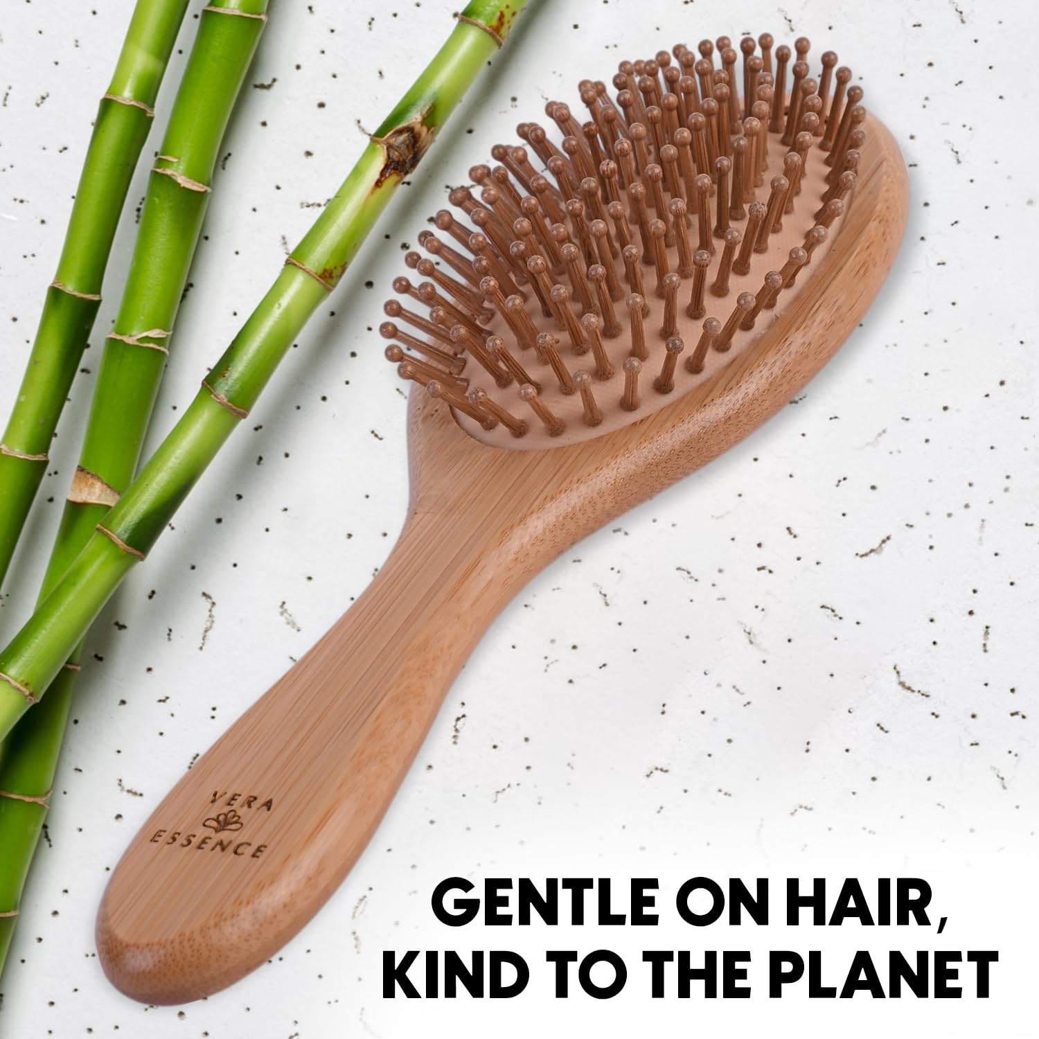 Vera Essence bamboo brush eco-friendly wood finish supports sustainable hair care.