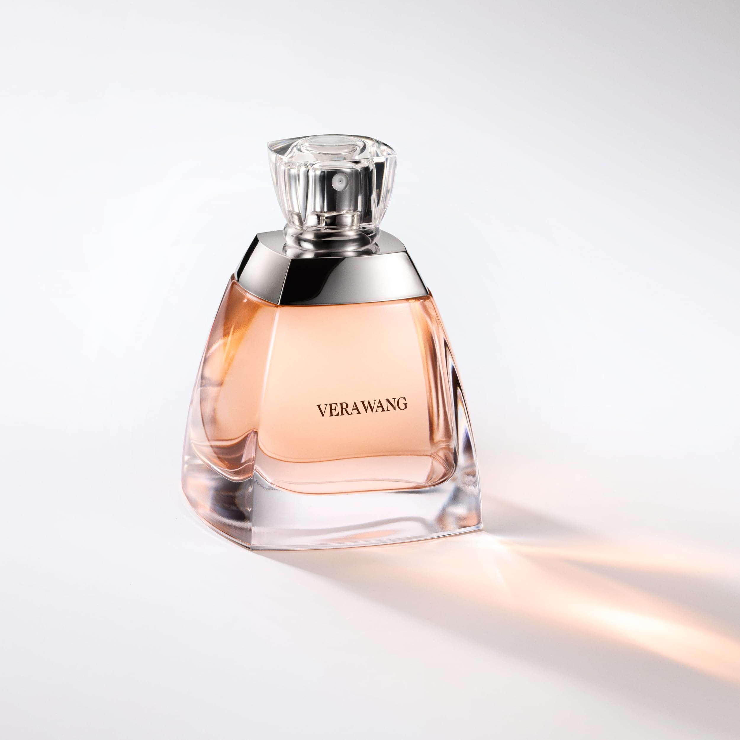 Vera Wang EDP on skin shows refined, long-lasting scent for nights out.