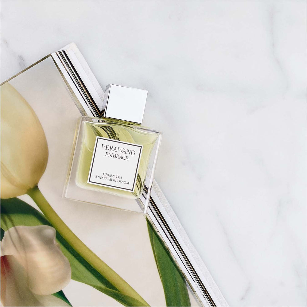 Vera Wang Embrace heart note featuring freesia and peony bouquet