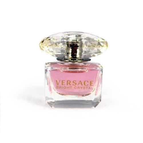 Versace Bright Crystal mini splash application demonstrates quick, refreshing aroma for busy days.