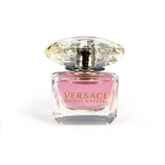 Versace Bright Crystal mini splash application demonstrates quick, refreshing aroma for busy days.