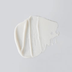 Versed Day Maker microcrystal beads closeup highlights biodegradable exfoliants for gentle buffing.