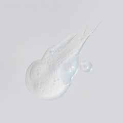 Versed Purist foaming lather closeup demonstrates gentle daily cleanser.