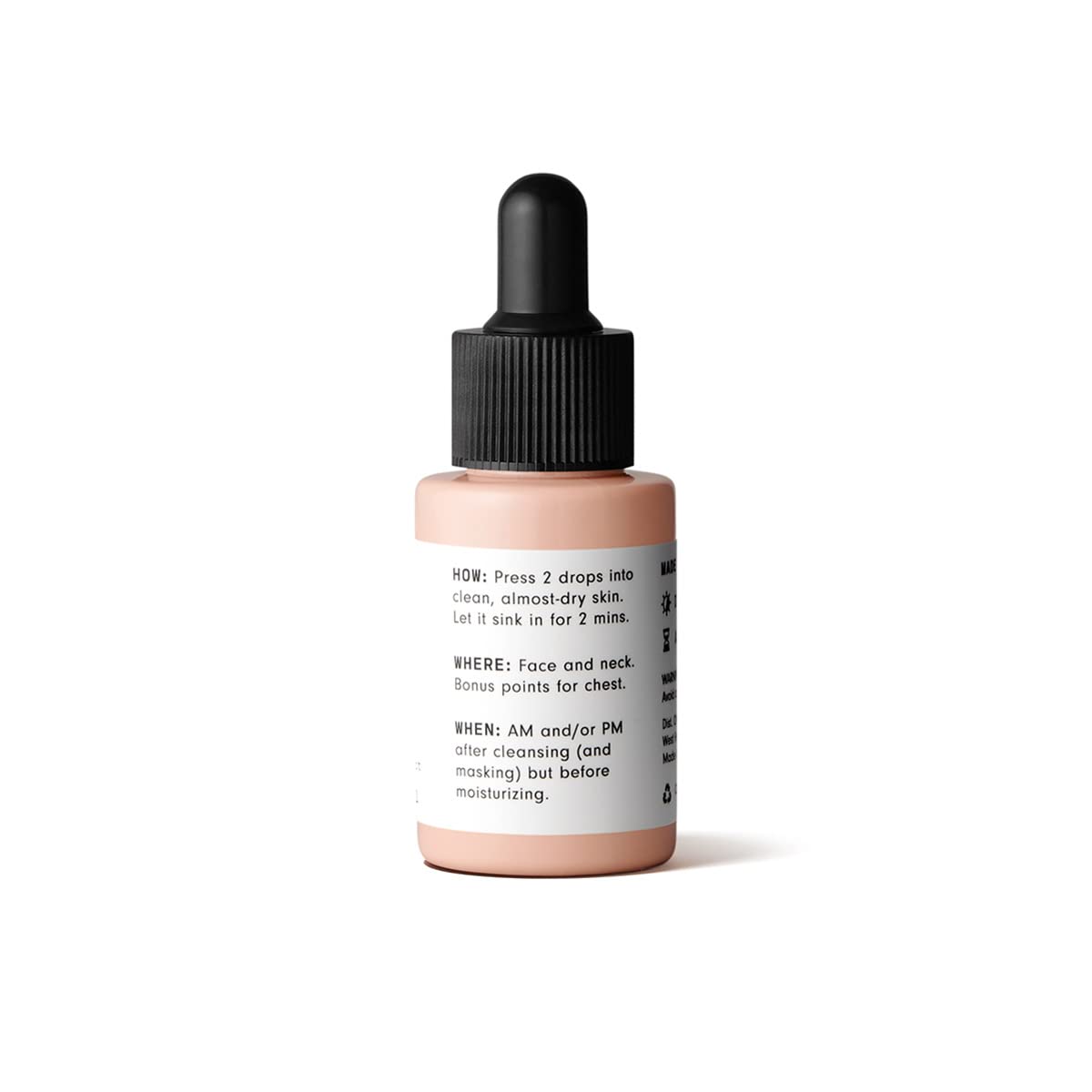 Versed Stroke of Brilliance Serum amber bottle on shelf suggests premium, brightening skincare.
