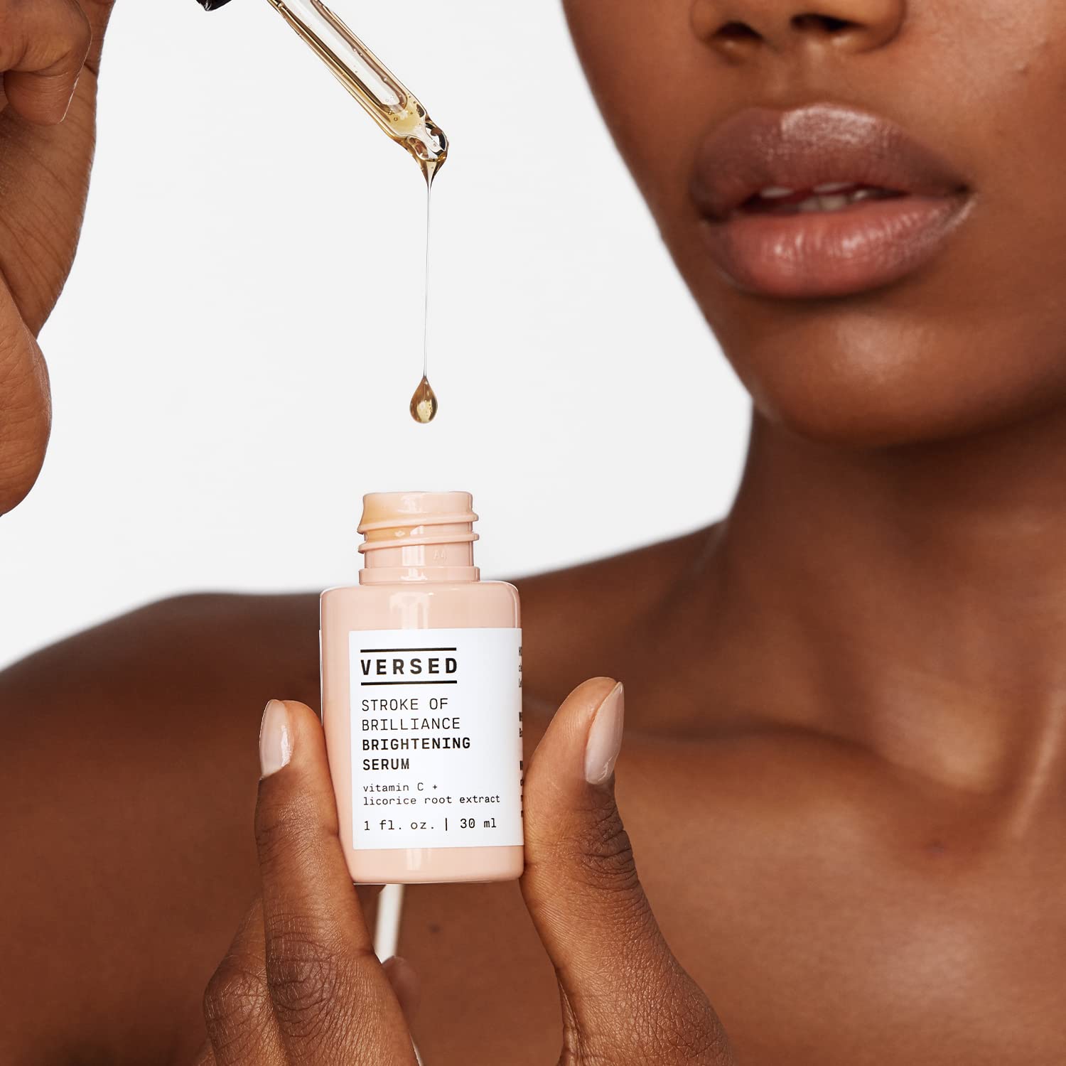 Versed Stroke of Brilliance Serum packaging box beside bottle signals vegan, clean ingredients.
