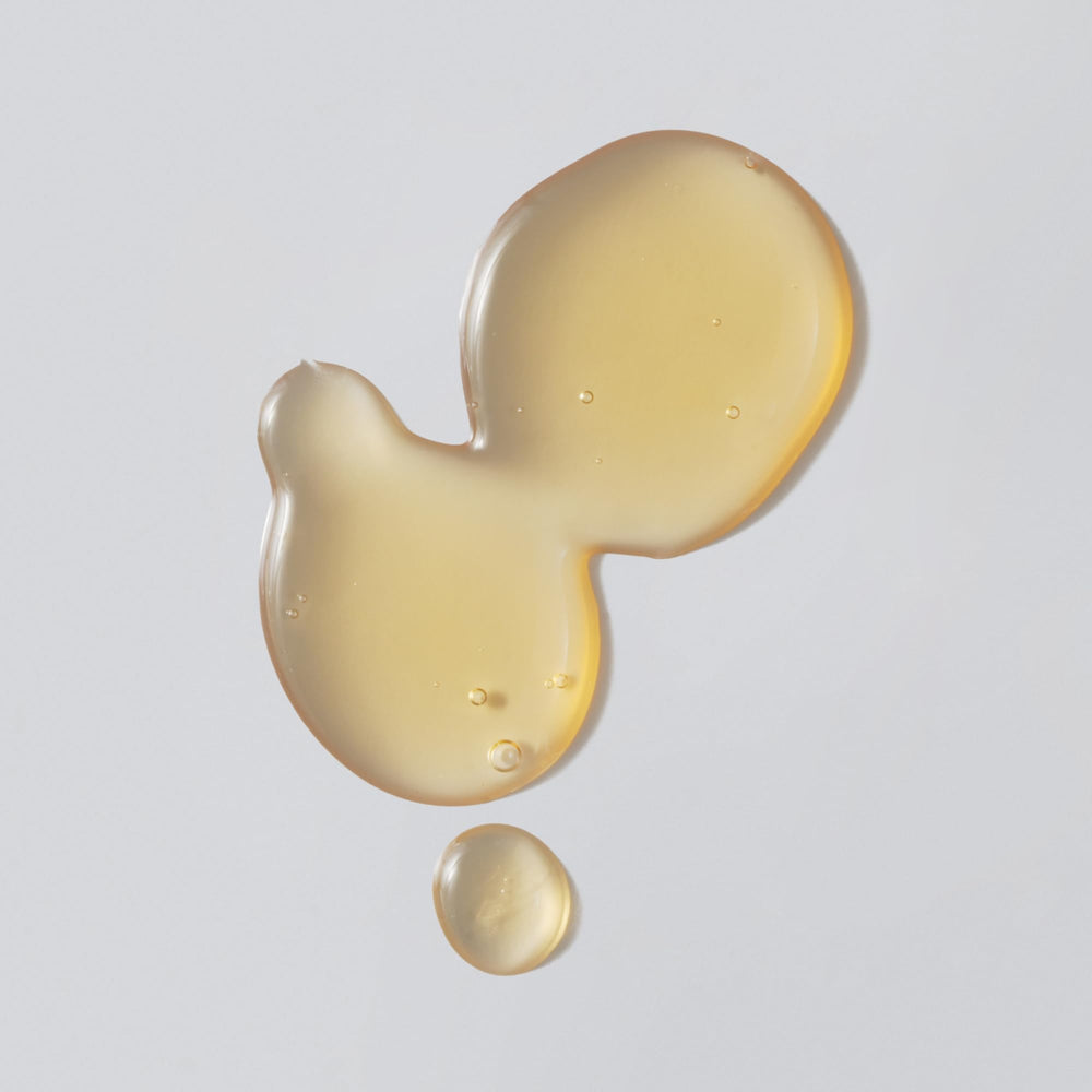 Versed Weekend Glow serum texture closeup highlights non-sticky, fast-absorb formula ideal daily use