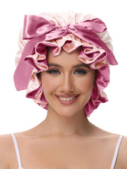 Vettres adjustable tie-band bonnet provides customizable fit and stylish bow option.