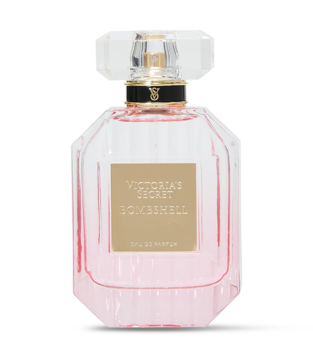 Close-up of Bombshell EDP heart with Shangri-La peony blossom for a luminous floral core.