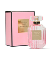 Victoria's Secret Bombshell EDP bottle pour shows bright fruity opening for daytime energy.
