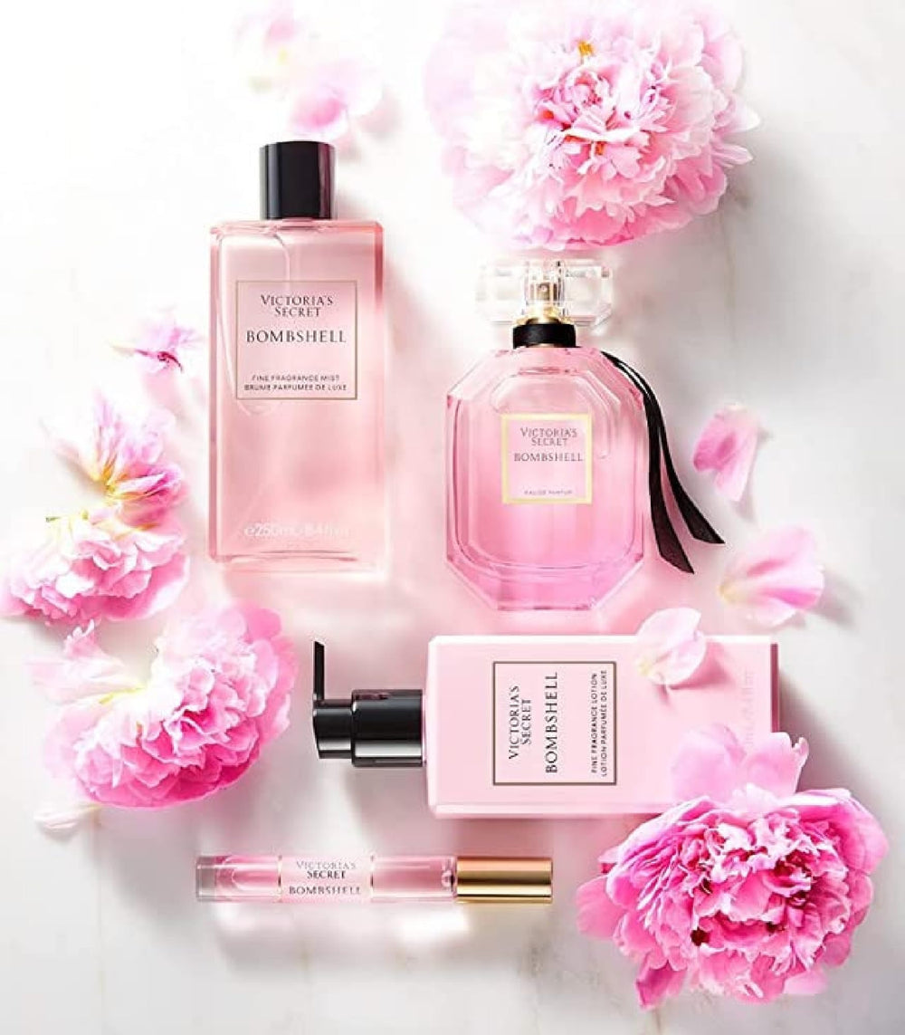 Victoria's Secret Bombshell mist application demonstrates easy layering and travel use