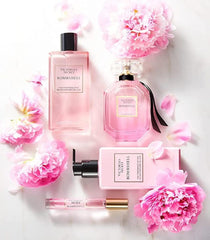 Victoria's Secret Bombshell mist application demonstrates easy layering and travel use
