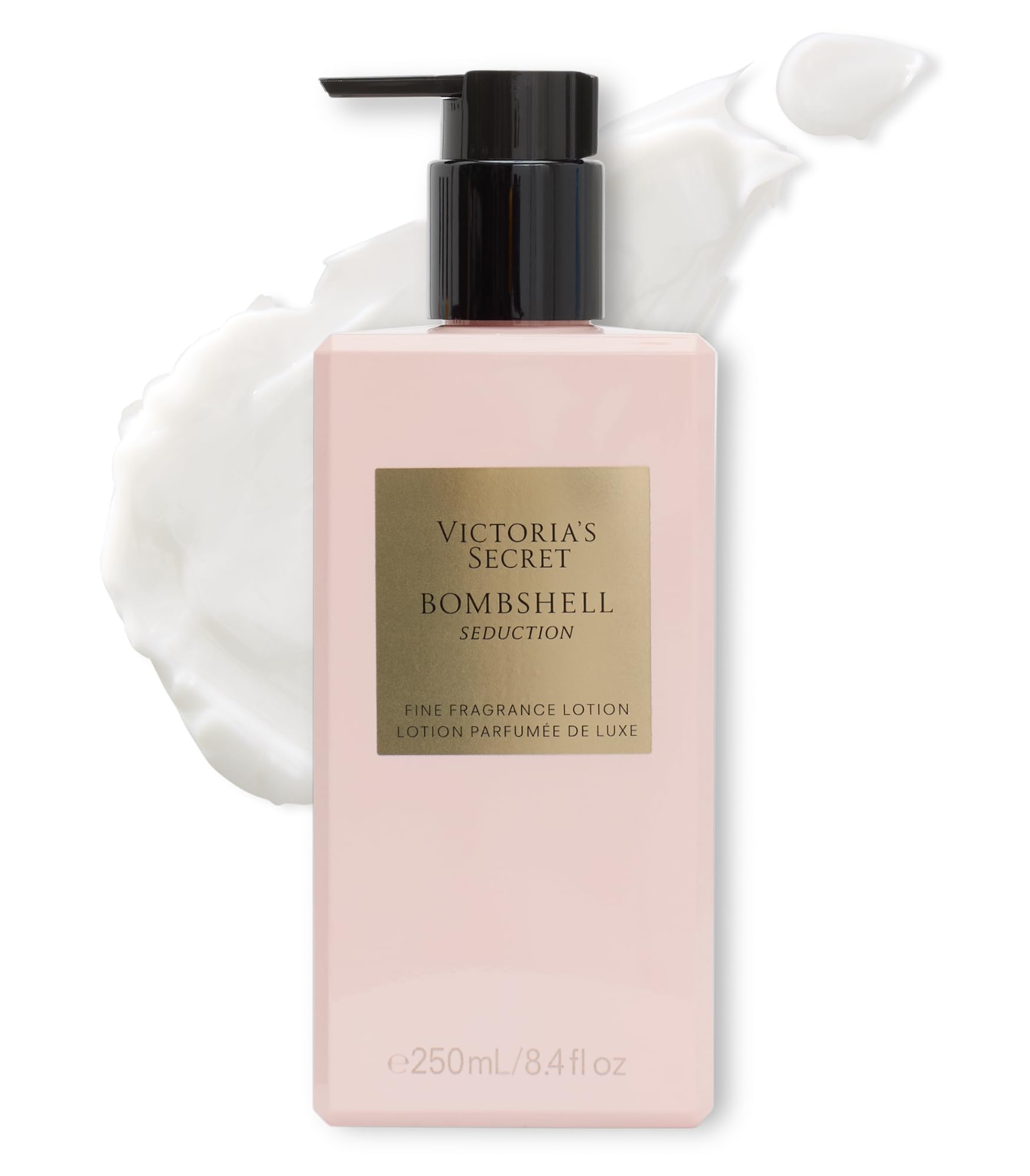 Victoria's Secret Bombshell Seduction lotion bottle on a dresser for everyday fragrance.