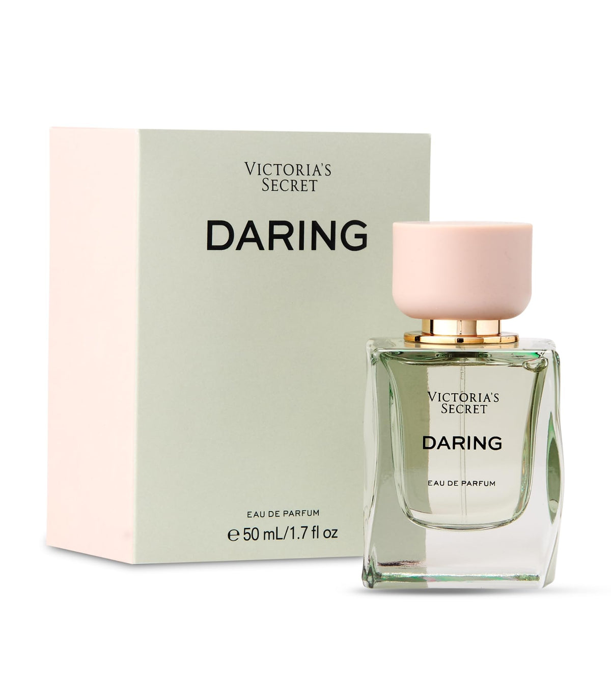 Victoria's Secret Daring EDP bottle with gleaming glass evokes bergamot brightness for daytime elegance.