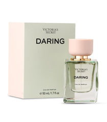 Victoria's Secret Daring EDP bottle with gleaming glass evokes bergamot brightness for daytime elegance.