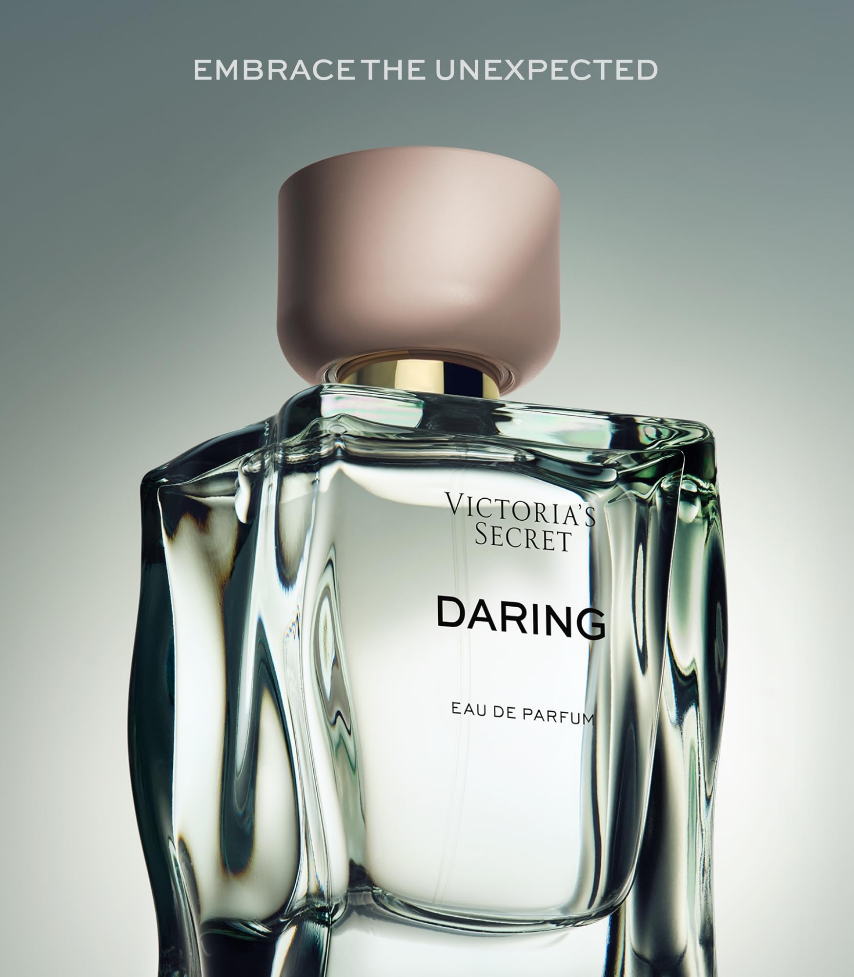 Victoria's Secret Daring EDP cap close-up, suggesting sleek luxury and confident night-out vibe.