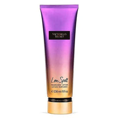 Victoria's Secret Love Spell lotion bottle shows cherry blossom and peach fragrance for daily hydration.