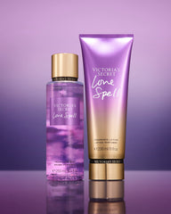 Victoria's Secret Love Spell lotion applied on hands delivering quick softness and moisture.