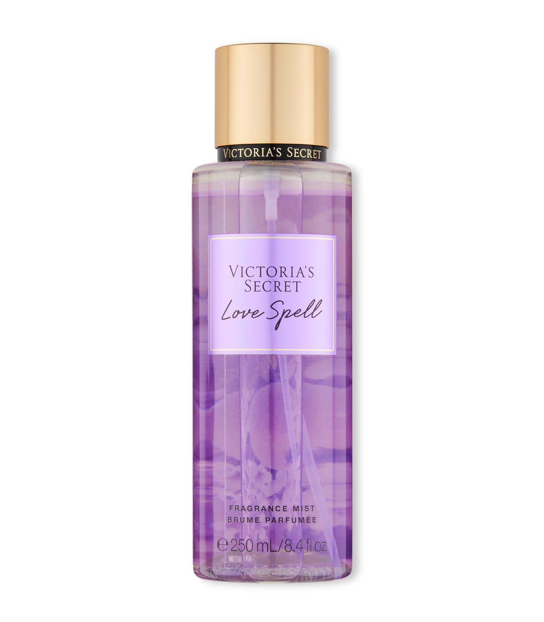 Victoria's Secret Love Spell mist bottle close-up highlighting peach and cherry blossom notes for a delicate scent.