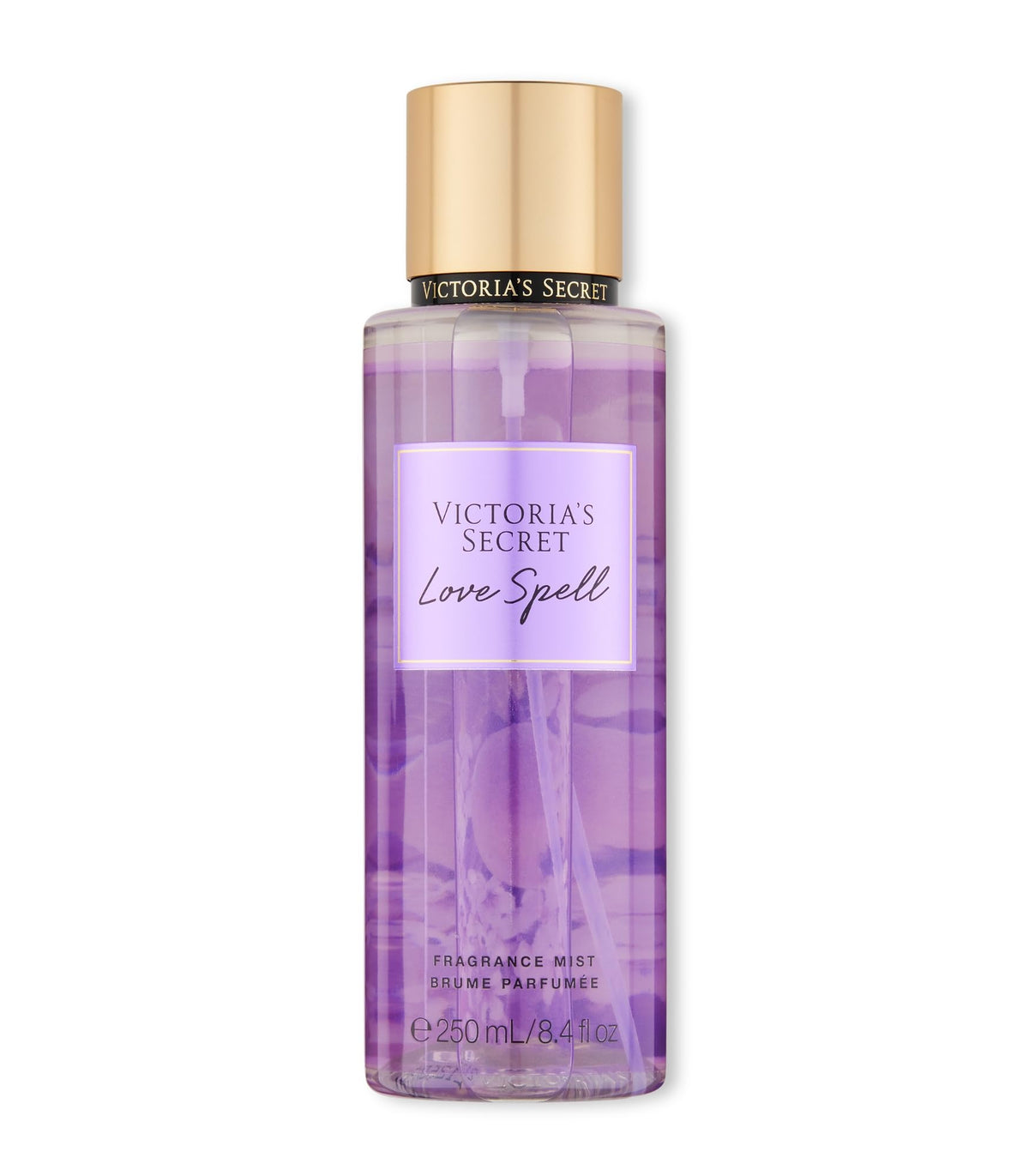 Victoria's Secret Love Spell mist bottle close-up highlighting peach and cherry blossom notes for a delicate scent.