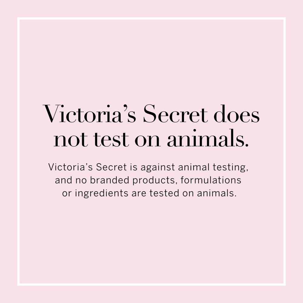Victoria's Secret Love Spell mist bottle on vanity showcasing feminine, romantic vibe.