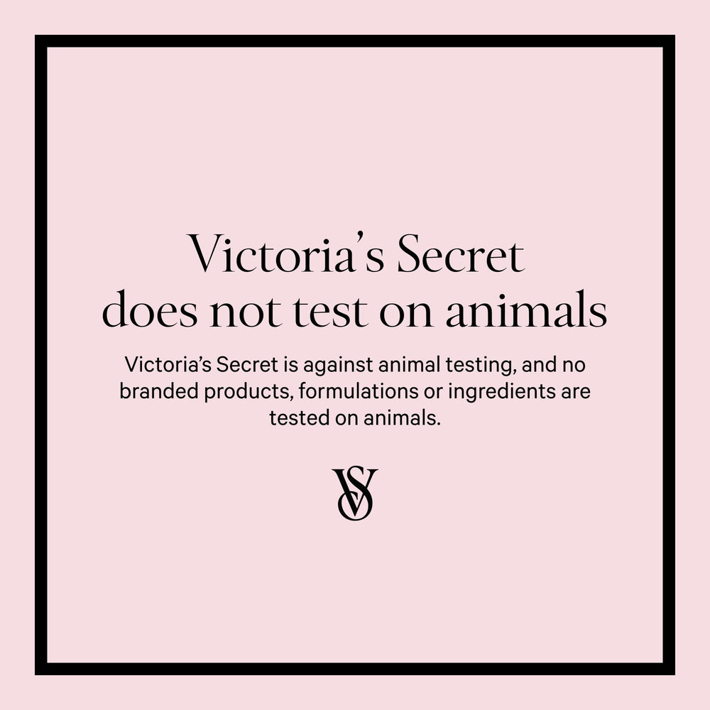Victoria's Secret Love Spell packaging close-up with petals for sensory appeal.