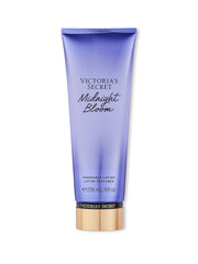 Victoria's Secret Midnight Bloom lotion bottle supports daily moisturization with a light fragrance boost.