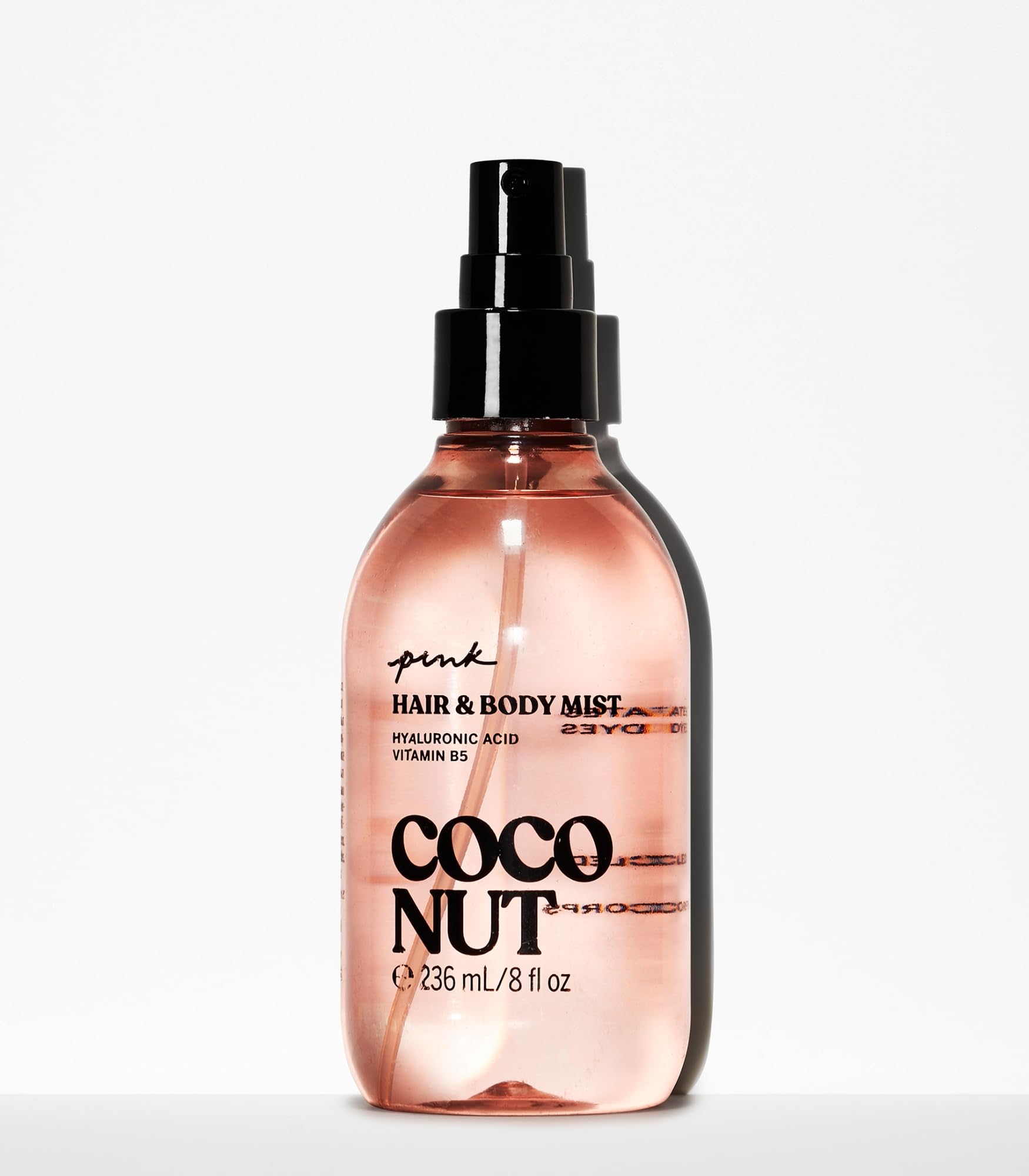 Victoria's Secret PINK Coconut Hair & Body Mist spray in action for quick hydration.