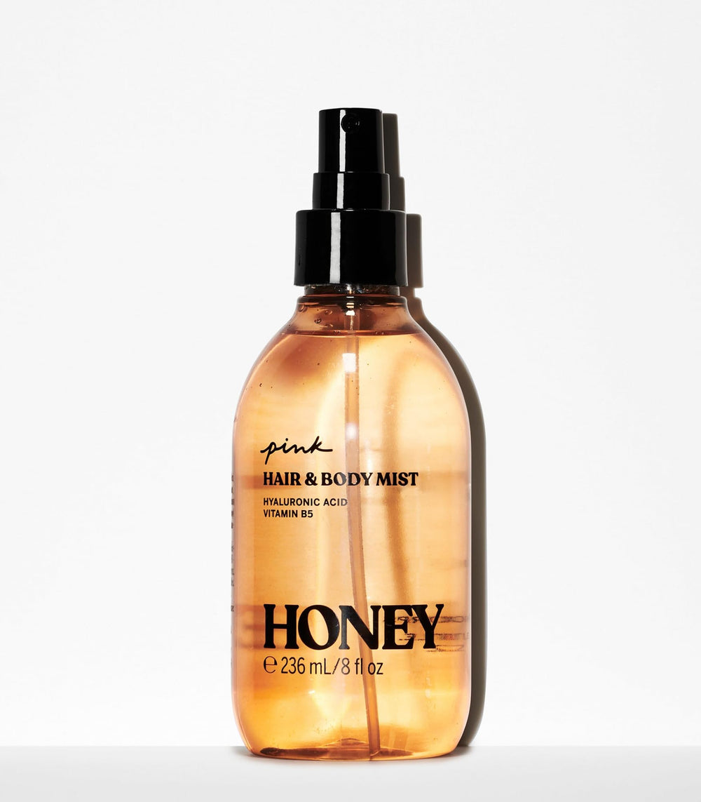 Victoria's Secret Honey Hair & Body Mist spray for even, feather-light application.