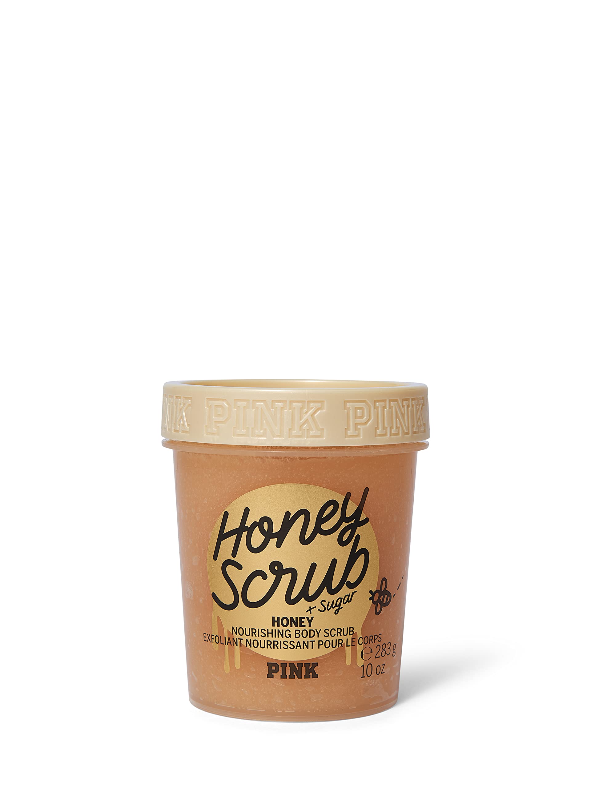 Victoria's Secret Pink Honey Nourishing Scrub jar on counter for smooth, radiant skin prep.