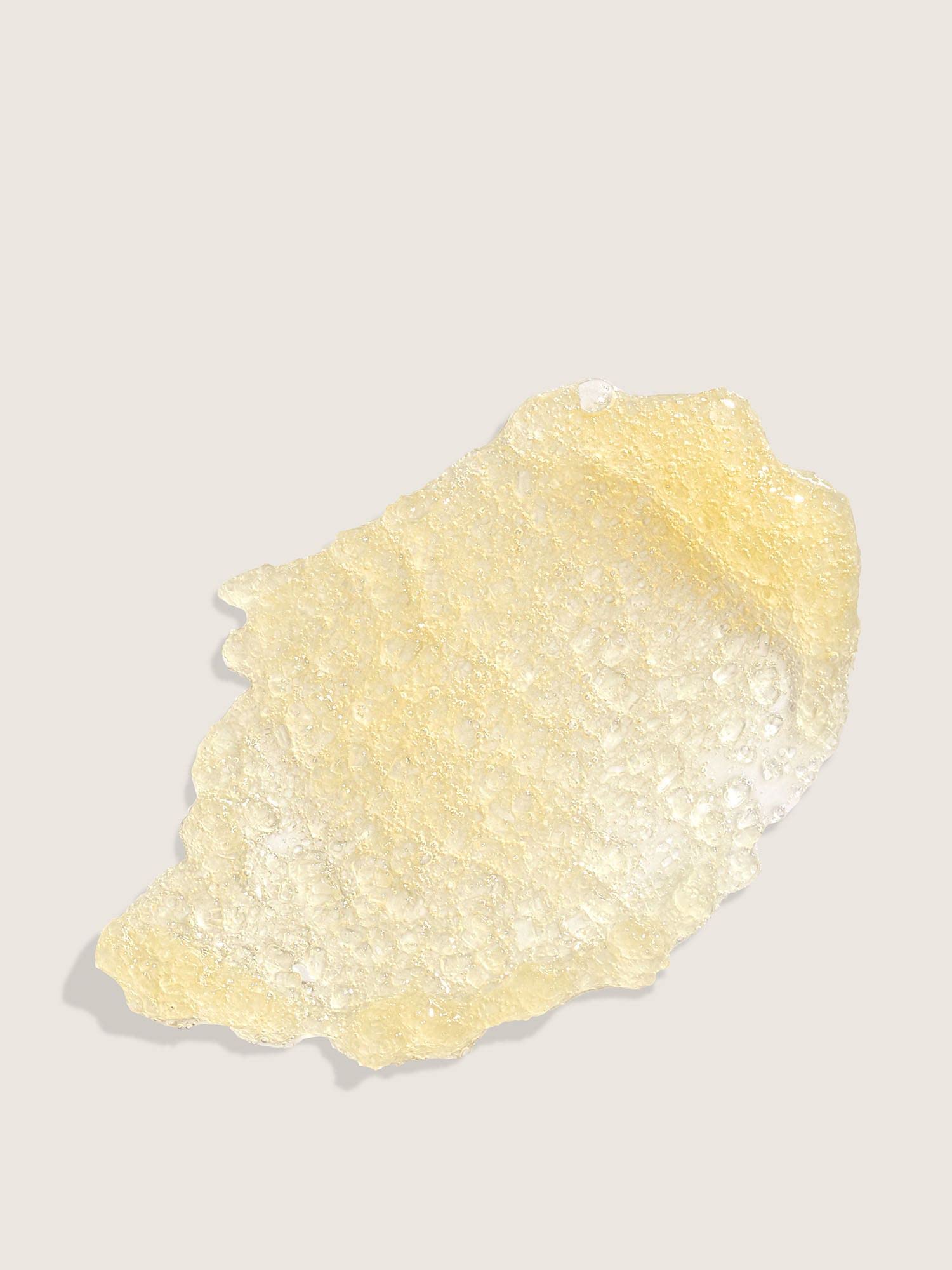 Victoria's Secret Pink Honey Nourishing Scrub sugar-crystals close-up for gentle exfoliation and glow.