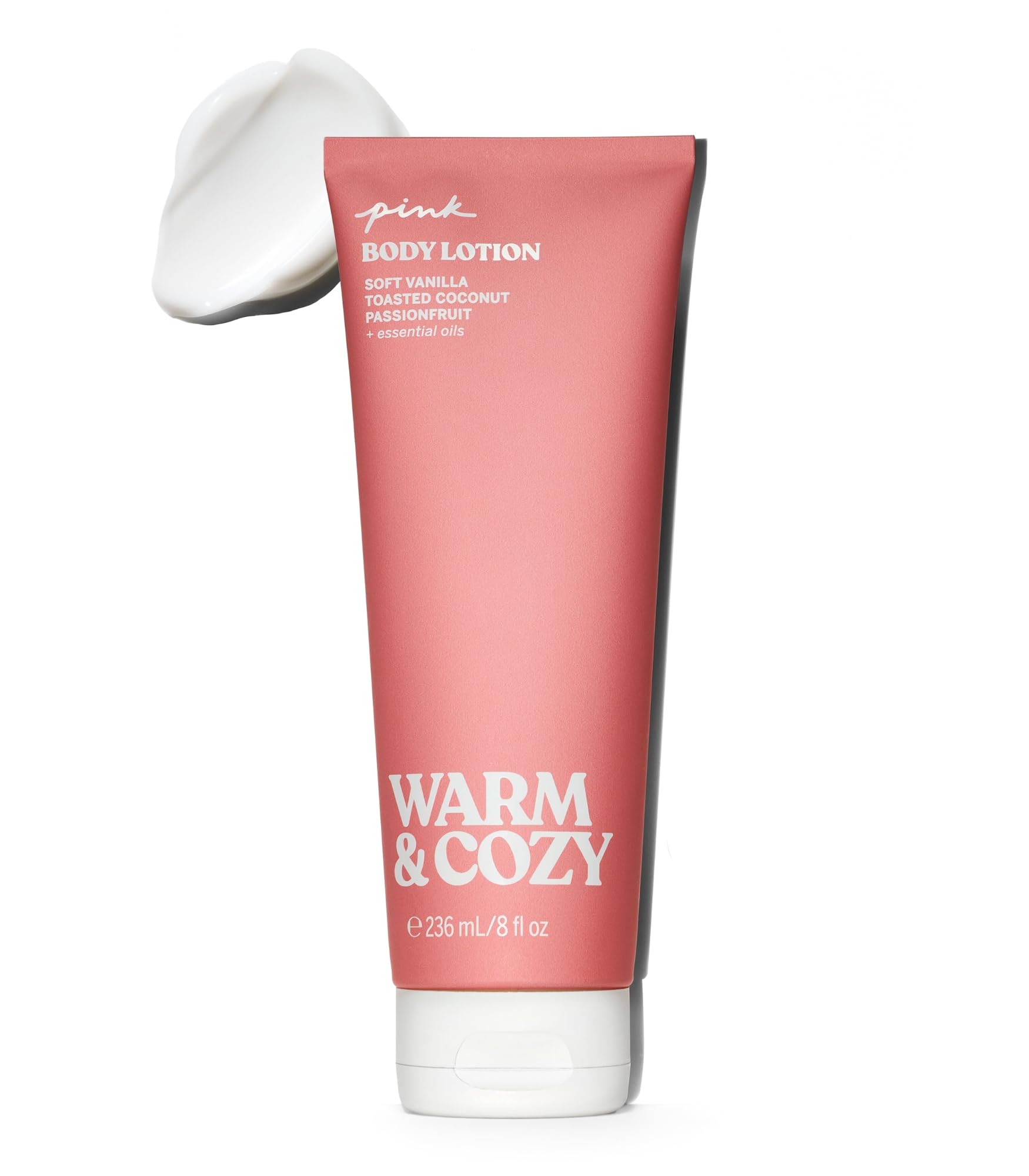Victoria's Secret PINK Warm and Cozy lotion bottle shows comforting vanilla coconut fragrance.