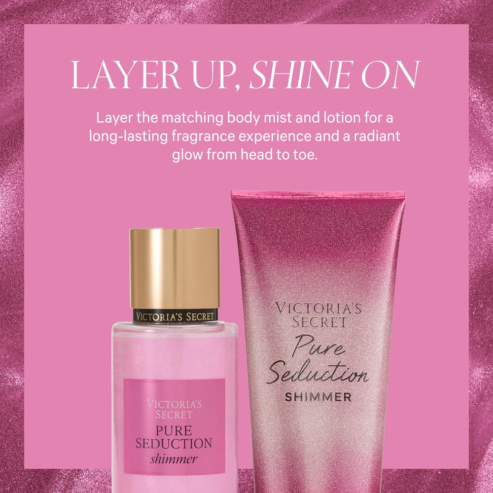 Victoria's Secret Pure Seduction Shimmer spray-action shot emphasizing light, refreshing mist.