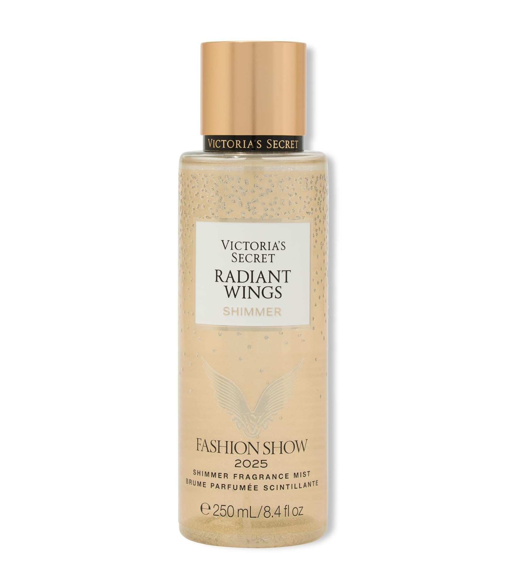 Victoria's Secret Radiant Wings bottle on vanity, sparkling fragrance for everyday glamour and confidence.