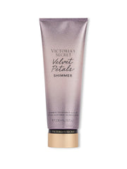Victoria's Secret Velvet Petals Shimmer Lotion bottle for everyday scented hydration.