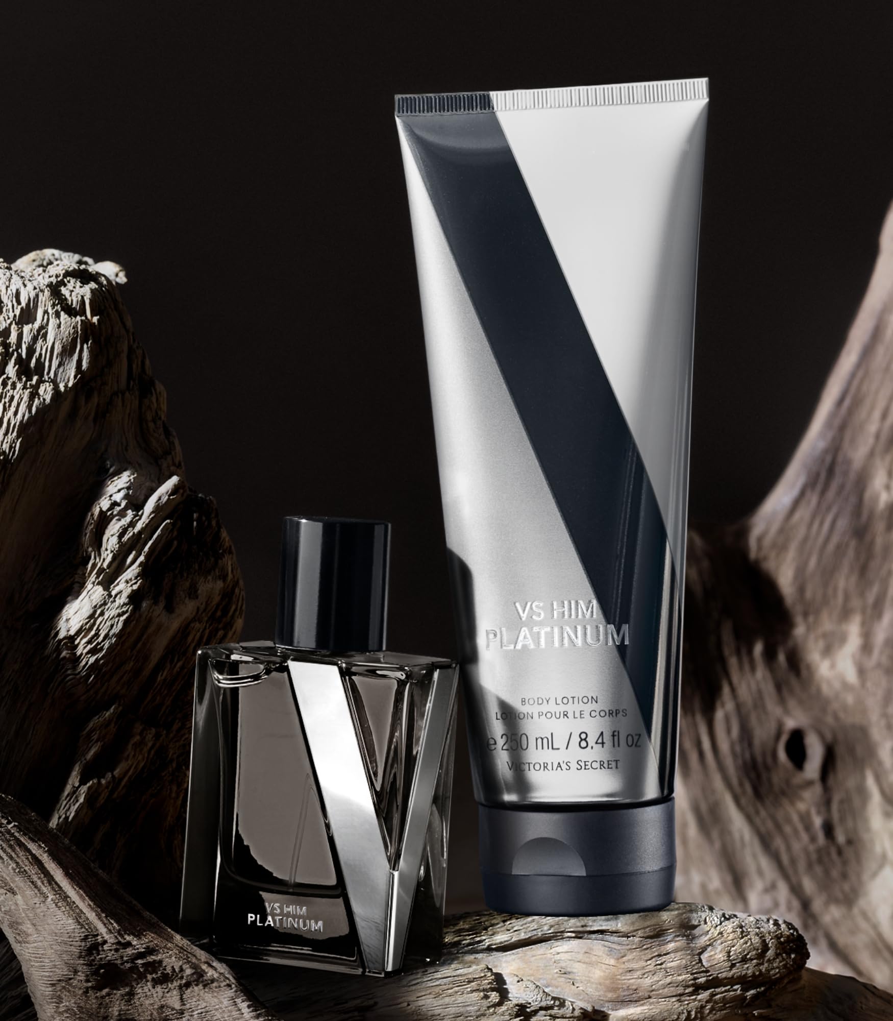 Victoria's Secret VS Him Platinum packaging on shelf conveying modern masculine aesthetic.