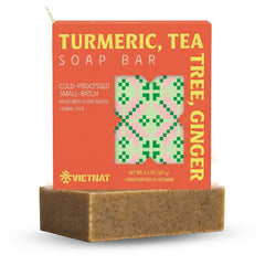 VIETNAT turmeric-tea-tree-ginger soap bar raw block showcases natural ingredients for everyday cleanse.