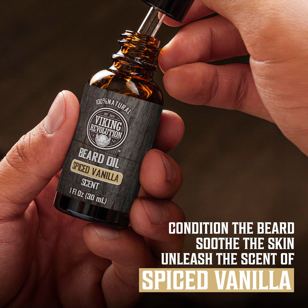 Beard oil dropper from Viking Revolution kit highlighting argan and jojoba nourishment.