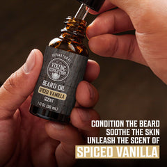 Beard oil dropper from Viking Revolution kit highlighting argan and jojoba nourishment.