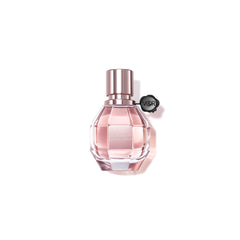 Viktor&Rolf Flowerbomb bottle closeup — floral sparkle for date-night impression.