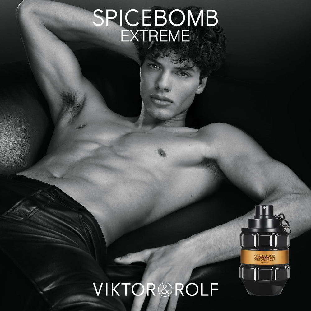 Dramatic woody tone in Viktor&Rolf Spicebomb Extreme image suggests masculine confidence.