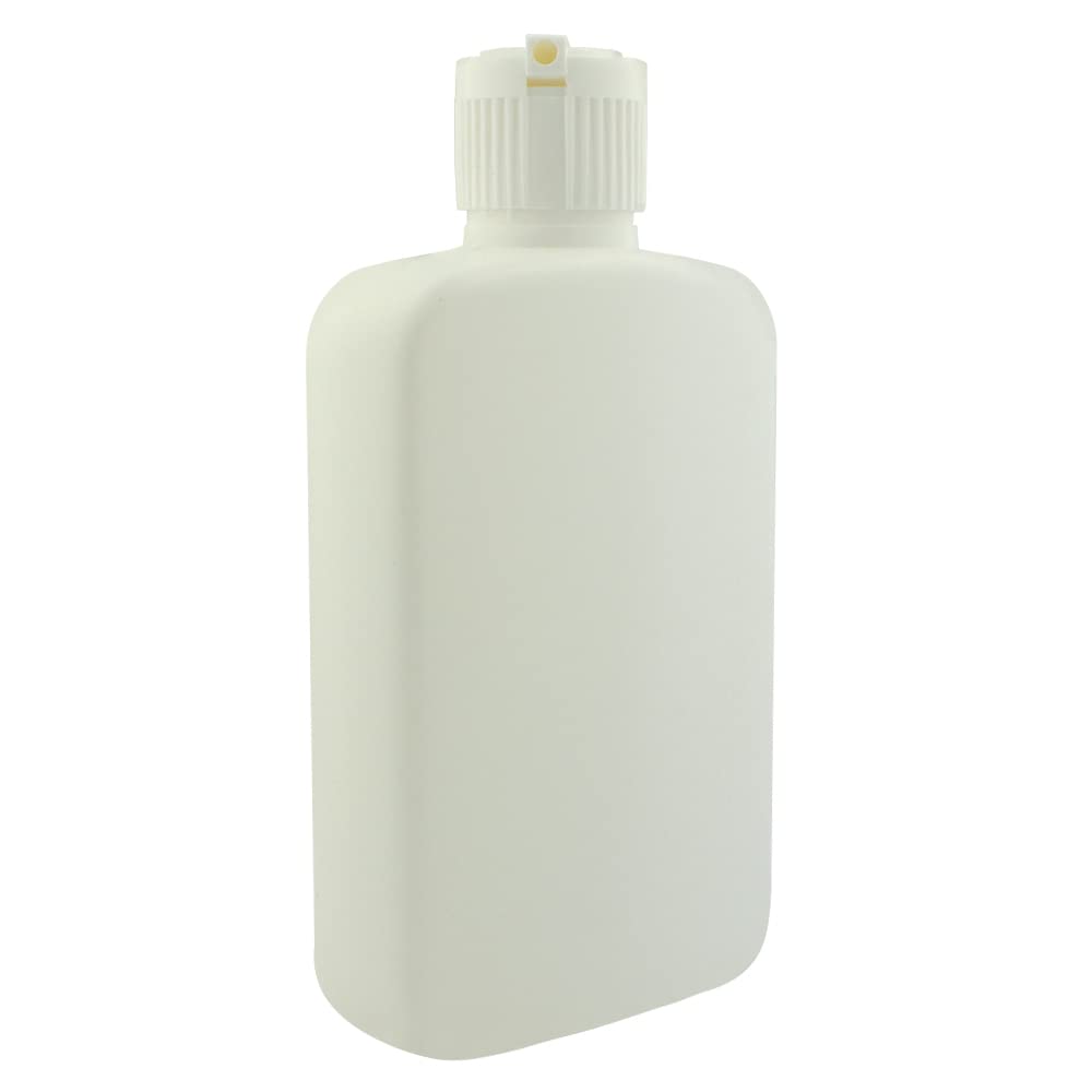 Village Gift Importers white holy water bottle in use at home ritual.